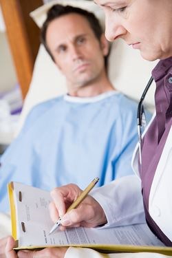 Image of a doctor diagnosing a patient